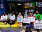 Doctors and interns sit on a strike for 24 hours at the entrance of a government hospital in a protest against last week's rape and killing of a trainee doctor at a government hospital, in Kolkata, Doctors and interns sit on a strike for 24 hours at the entrance of a government hospital in a protest against last week's rape and killing of a trainee doctor at a government hospital, in Kolkata,