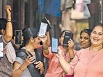 Women expressing their happiness over the deposit of <span class='webrupee'>₹</span>3000 in their accounts under the Maharashtra government's Ladki Bahin Yojana in Mumbai (Photo by Satish Bate/ Hindustan Times) (Hindustan Times) Women expressing their happiness over the deposit of <span class='webrupee'>₹</span>3000 in their accounts under the Maharashtra government's Ladki Bahin Yojana in Mumbai (Photo by Satish Bate/ Hindustan Times) (Hindustan Times)