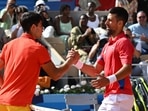 Paris: Novak Djokovic of Serbia (R) shakes hands with Carlos Alcaraz of Spain (L) after the Men Singles gold medal match of the Tennis competitions in the Paris 2024 Olympic Games Paris: Novak Djokovic of Serbia (R) shakes hands with Carlos Alcaraz of Spain (L) after the Men Singles gold medal match of the Tennis competitions in the Paris 2024 Olympic Games