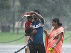 Visitors at Kartavya Path amid monsoon rain in New Delhi, India. Monsoon season health guide: Expert tips on managing viral fever and infections during rainy season (Photo by Sanjeev Verma/Hindustan Times) Visitors at Kartavya Path amid monsoon rain in New Delhi, India. Monsoon season health guide: Expert tips on managing viral fever and infections during rainy season (Photo by Sanjeev Verma/Hindustan Times)