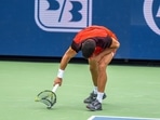 Carlos Alcaraz of Spain smashes his racket during his match against Gael Monfils of France 