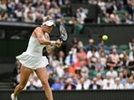 Czech Republic's Marketa Vondrousova returns the ball to Spain's Jessica Bouzas Maneiro during their women's singles tennis match on the second day of the 2024 Wimbledon Championships