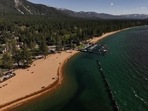 In an aerial view, Lake Tahoe is seen at near full capacity at Lakeside Beach on May 22, 2024 in South Lake Tahoe, California. (Justin Sullivan/Getty Images via AFP) In an aerial view, Lake Tahoe is seen at near full capacity at Lakeside Beach on May 22, 2024 in South Lake Tahoe, California. (Justin Sullivan/Getty Images via AFP)