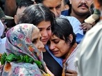 Wrestler Vinesh Phogat being consoled by Sakshi Malik after she broke down on her arrival after the Paris Olympics heartbreak, at IGI airport, in New Delhi