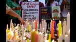 Medical professionals light candles while calling for justice for Kolkata’s rape-murder victim, in Jalandhar on Saturday. (AFP) Medical professionals light candles while calling for justice for Kolkata’s rape-murder victim, in Jalandhar on Saturday. (AFP)
