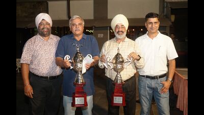 (From left) CGC president Ravibir Singh with Independence Day Cup winners Rohit Singh Dagar and Kulwaran Singh, and Dr Agnish Rajesh, chairman, tournaments and handicapping. (HT Photo)