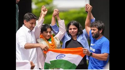 Congress MP Deepender Hooda and grapplers Vinesh Phogat, Sakshi Malik and Bajrang Punia in Jhajjar on Saturday. (Manoj Dhaka/HT) Congress MP Deepender Hooda and grapplers Vinesh Phogat, Sakshi Malik and Bajrang Punia in Jhajjar on Saturday. (Manoj Dhaka/HT)