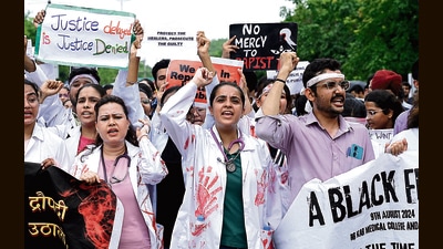 Doctors taking out a march from PGIMER to Sector 17 in Chandigarh on Saturday. They demanded justice for the rape-murder victim and safer work environment for health care workers. (HT Photo)