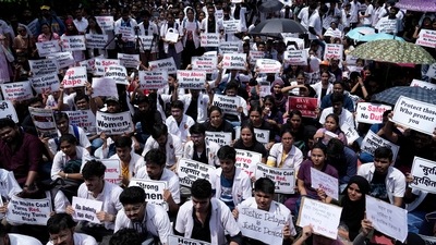 Resident doctors and medical students across the city's government hospital staged a protest against the alleged rape and killing of a woman doctor at Kolkata's RG Kar Medical College and Hospital in Mumbai. (AP) Resident doctors and medical students across the city's government hospital staged a protest against the alleged rape and killing of a woman doctor at Kolkata's RG Kar Medical College and Hospital in Mumbai. (AP)