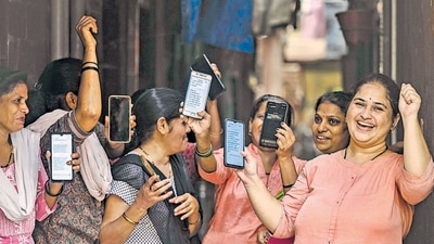 Women expressing their happiness over the deposit of ₹3000 in their accounts under the Maharashtra government's Ladki Bahin Yojana in Mumbai (Photo by Satish Bate/ Hindustan Times) (Hindustan Times) Women expressing their happiness over the deposit of ₹3000 in their accounts under the Maharashtra government's Ladki Bahin Yojana in Mumbai (Photo by Satish Bate/ Hindustan Times) (Hindustan Times)