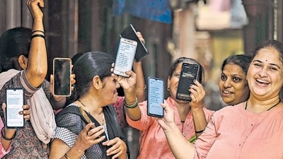 Mumbai, India - Aug. 16, 2024: Women expressing their happiness over the deposit of ?3000 in women's accounts under the Maharashtra Government's Ladki Bahin Yojana in Mumbai, India, on Friday, August 16, 2024. (Photo by Satish Bate/ Hindustan Times) (Hindustan Times) Mumbai, India - Aug. 16, 2024: Women expressing their happiness over the deposit of ?3000 in women's accounts under the Maharashtra Government's Ladki Bahin Yojana in Mumbai, India, on Friday, August 16, 2024. (Photo by Satish Bate/ Hindustan Times) (Hindustan Times)