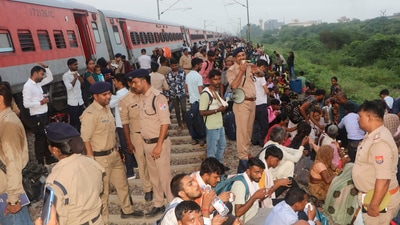 Police personnel during a rescue operarion after coaches of the Sabarmati Express passenger train derailed between Kanpur and Bhimsen station in Uttar Pradesh, on Saturday. (PTI) Police personnel during a rescue operarion after coaches of the Sabarmati Express passenger train derailed between Kanpur and Bhimsen station in Uttar Pradesh, on Saturday. (PTI)