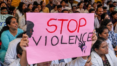 A resident doctor holds a placard during protest amid the 24-hour nationwide strike called by the Indian Medical Association (IMA) demanding justice for the woman doctor who was allegedly raped and murdered at Kolkata's R G Kar Medical College and Hospital, in Bengaluru on Saturday. (PTI)
