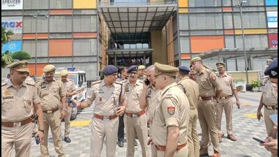 Police conduct search operations at the mall on Saturday. (HT Photo) Police conduct search operations at the mall on Saturday. (HT Photo)