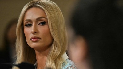 US media personality Paris Hilton looks on during a House Committee on Ways and Means hearing on "Strengthening Child Welfare and Protecting Americas Children," on Capitol Hill in Washington, DC, on June 26, 2024. (AFP) US media personality Paris Hilton looks on during a House Committee on Ways and Means hearing on "Strengthening Child Welfare and Protecting Americas Children," on Capitol Hill in Washington, DC, on June 26, 2024. (AFP)
