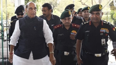Union defence minister Rajnath Singh with Chief of Defence Staff General Anil Chauhan (middle) and Indian Army chief General Manoj Pande at the Manekshaw Auditorium in New Delhi on Tuesday. (ANI Photo)