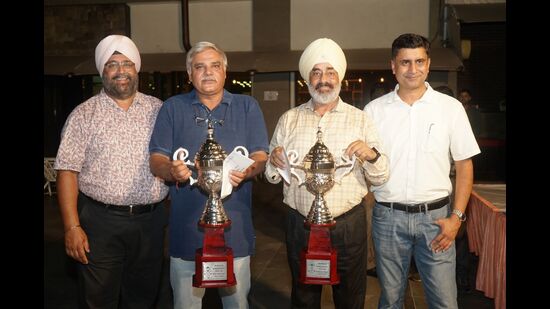 (From left) CGC president Ravibir Singh with Independence Day Cup winners Rohit Singh Dagar and Kulwaran Singh, and Dr Agnish Rajesh, chairman, tournaments and handicapping. (HT Photo)
