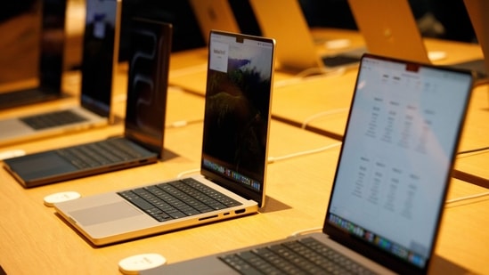 Apple Inc. MacBook Pro computers on display inside the company's store during its opening in Kuala Lumpur, Malaysia, on Saturday, June 22, 2024. Malaysia is becoming an increasingly key country for Apple on both production and sales fronts. (Samsul Said/Bloomberg)