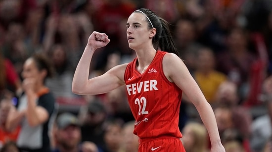 Indiana Fever guard Caitlin Clark reacts during the first half of a WNBA basketball game against the Phoenix Mercury, Friday, Aug. 16, 2024, in Indianapolis. (AP Photo/Darron Cummings)