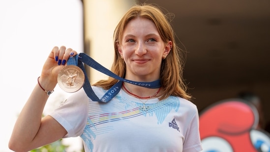 Romanian gymnast Ana Barbosu poses with the bronze medal for her individual performance in artistic gymnastics on the floor at the 2024 Olympic Games in Paris (AP)