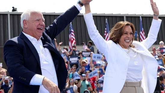 FILE PHOTO: U.S. Vice President and Democratic presidential candidate Kamala Harris and her running mate Minnesota Governor Tim Walz hold a campaign event in Eau Claire, Wisconsin, U.S., August 7, 2024. REUTERS/Kevin Mohatt/File Photo(REUTERS)