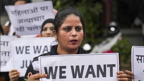 Women protest demanding justice for the doctor who was allegedly raped and murdered at Kolkata's R G Kar Medical College and Hospital in Mumbai on Saturday. (PTI)