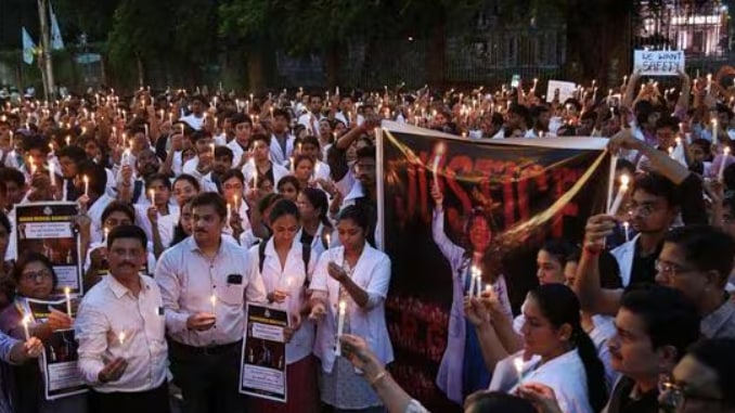 Doctors take part in a candlelight protest(ANI)