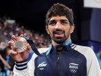 Paris: Bronze medalist India's Aman Sehrawat poses for photos during the victory ceremony for the men's 57kg free-style wrestling(PTI)