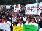 Resident doctors and medical students staged a protest against the Kolkata case, in Bengaluru on Saturday. (PTI)
