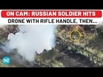 On Camera: Russian Soldier Hits Killer Drone With Rifle Handle, Then This Happens… On Camera: Russian Soldier Hits Killer Drone With Rifle Handle, Then This Happens…
