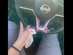 The woman shared this picture of the pain ball that was thrown inside her car. The woman shared this picture of the pain ball that was thrown inside her car.
