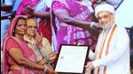 Union home minister Amit Shah distributes citizenship certificates under CAA to refugees from Pakistan, Bangladesh and Afghanistan, in Ahmedabad on Sunday. (Amit Shah-X) Union home minister Amit Shah distributes citizenship certificates under CAA to refugees from Pakistan, Bangladesh and Afghanistan, in Ahmedabad on Sunday. (Amit Shah-X)