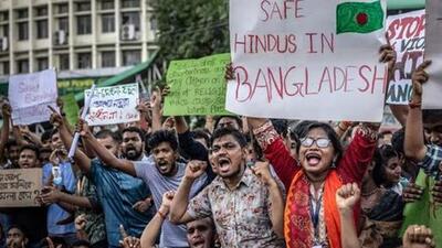 Bangladeshi Hindus protesting against the violence that has taken place against their businesses and homes after Sheikh Hasina’s ouster (AFP Photo)