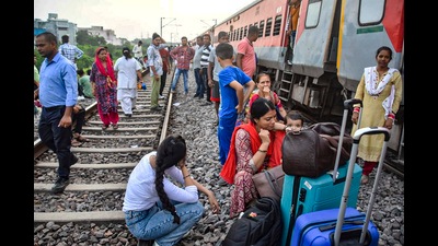 Passengers sit outside the Sabarmati Express after twenty coaches of the train derailed near Govindpuri station, in Kanpur. (PTI FILE) Passengers sit outside the Sabarmati Express after twenty coaches of the train derailed near Govindpuri station, in Kanpur. (PTI FILE)