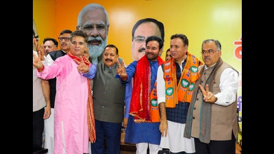 Union minister G Kishan Reddy, MoS Jitendra Singh, BJP national general secretary Tarun Chugh and J&K BJP president Ravinder Raina with former J&K minister Choudhary Zulfikar Ali after Ali joined BJP, in Jammu, on Sunday. (PTI) Union minister G Kishan Reddy, MoS Jitendra Singh, BJP national general secretary Tarun Chugh and J&K BJP president Ravinder Raina with former J&K minister Choudhary Zulfikar Ali after Ali joined BJP, in Jammu, on Sunday. (PTI)