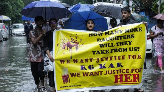 Doctors and nursing students protested in Calcutta on Sunday against the rape and murder of the aspiring doctor. (AP)