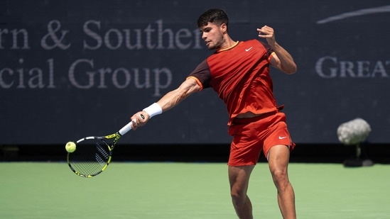 Carlos Alcaraz of Spain returns a shot during his match against Gael Monfils of France on day five of the Cincinnati Open(USA TODAY Sports via Reuters Con)