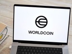 The Worldcoin logo on a laptop arranged in Germantown, New York, US, on Monday, July 24, 2023. Worldcoin, the digital identity and crypto payments project was co-founded by OpenAI Chief Executive Officer Sam Altman (Gabby Jones/Bloomberg) The Worldcoin logo on a laptop arranged in Germantown, New York, US, on Monday, July 24, 2023. Worldcoin, the digital identity and crypto payments project was co-founded by OpenAI Chief Executive Officer Sam Altman (Gabby Jones/Bloomberg)