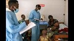 Health workers with children being treated for mpox in a treatment room at the Munigi mpox treatment center in North Kivu, Democratic Republic of Congo, on Saturday, Aug. 17, 2024  Photographer: Arlette Bashizi/Bloomberg (Bloomberg)