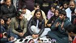 Indian wrestlers Vinesh Phogat (centre), Sakshi Malik (left) and Bajrang Punia (right) with others during the protest against the WFI at Jantar Mantar in New Delhi on January 18, 2023. (Raj K Raj/ HT Photo)