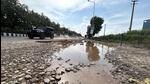 The pothole-riddled Southern Peripheral Road near Gurugram Sector 74A on Monday. (Parveen Kumar/HT Photo) The pothole-riddled Southern Peripheral Road near Gurugram Sector 74A on Monday. (Parveen Kumar/HT Photo)