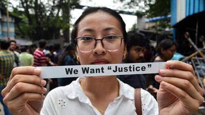 A junior doctor protests against the sexual assault and murder of a postgraduate trainee doctor at RG Kar Hospital in Kolkata on Monday. (ANI)