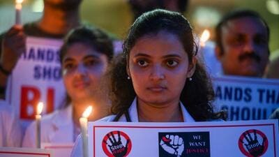 Doctors holding a candlelight vigil against the rape and murder of a second-year resident at RG Kar Medical College and Hospital in Kolkata on August 9. (HT File) Doctors holding a candlelight vigil against the rape and murder of a second-year resident at RG Kar Medical College and Hospital in Kolkata on August 9. (HT File)