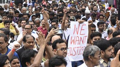 Doctors take out a protest march to Kolkata Police headquarters over police summons to two senior doctors in connection with public comments the trainee doctor who was raped and murdered. (Samir Jana/HT Photo) Doctors take out a protest march to Kolkata Police headquarters over police summons to two senior doctors in connection with public comments the trainee doctor who was raped and murdered. (Samir Jana/HT Photo)