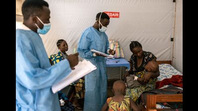 Health workers with children being treated for mpox in a treatment room at the Munigi mpox treatment center in North Kivu, Democratic Republic of Congo, on Saturday, Aug. 17, 2024 Photographer: Arlette Bashizi/Bloomberg (Bloomberg) Health workers with children being treated for mpox in a treatment room at the Munigi mpox treatment center in North Kivu, Democratic Republic of Congo, on Saturday, Aug. 17, 2024 Photographer: Arlette Bashizi/Bloomberg (Bloomberg)