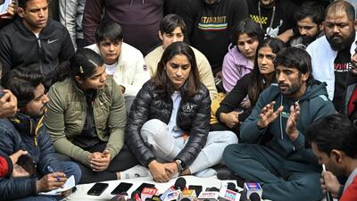Indian wrestlers Vinesh Phogat (centre), Sakshi Malik (left) and Bajrang Punia (right) with others during the protest against the WFI at Jantar Mantar in New Delhi on January 18, 2023. (Raj K Raj/ HT Photo) Indian wrestlers Vinesh Phogat (centre), Sakshi Malik (left) and Bajrang Punia (right) with others during the protest against the WFI at Jantar Mantar in New Delhi on January 18, 2023. (Raj K Raj/ HT Photo)