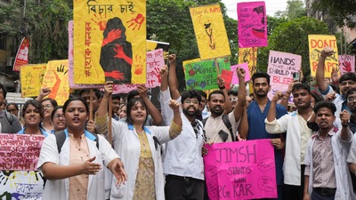 Junior doctors, trainee doctors and medical students protest against the sexual assault and killing of a post-graduate trainee doctor at RG Kar Medical College, in Kolkata (PTI) Junior doctors, trainee doctors and medical students protest against the sexual assault and killing of a post-graduate trainee doctor at RG Kar Medical College, in Kolkata (PTI)