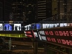 An electronic ticker displays stock figures in Shanghai, China. An electronic ticker displays stock figures in Shanghai, China.