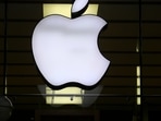 The Apple logo is illuminated at a store in the city center in Munich, Germany. The Apple logo is illuminated at a store in the city center in Munich, Germany.