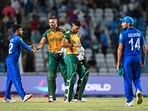 South Africa's players greets Afghanistan's players after South Africa's victory in the ICC men's Twenty20 World Cup 2024 semi-final cricket match between South Africa and Afghanistan at Brian Lara Cricket Academy in Tarouba